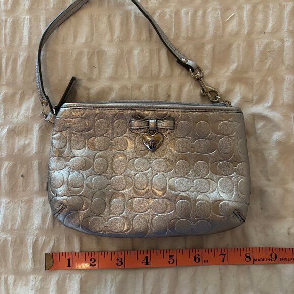 Authentic Coach Metallic Silver Wristlet with Heart Charm - Picture 1 of 5